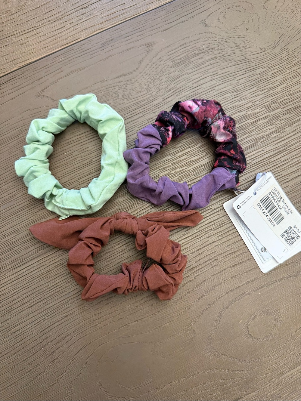 lululemon athletica 3-Pack Scrunchie Set in Mint, Purple print, and Rust